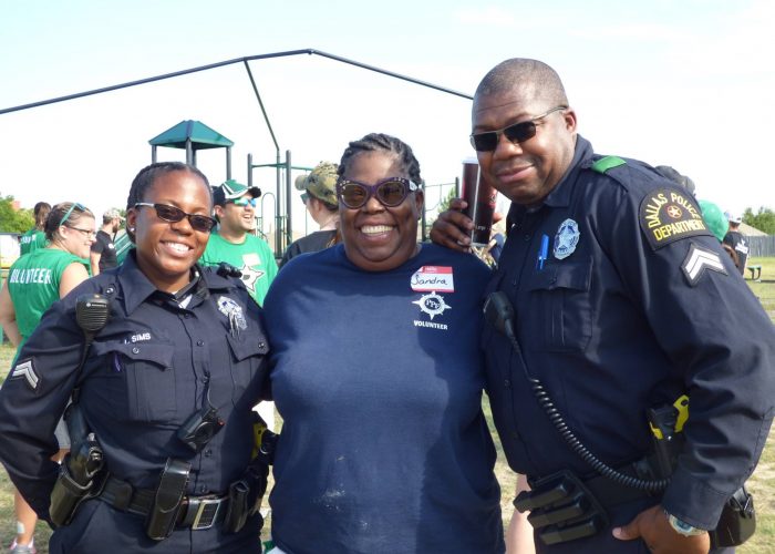 youth world playground volunteer and cop